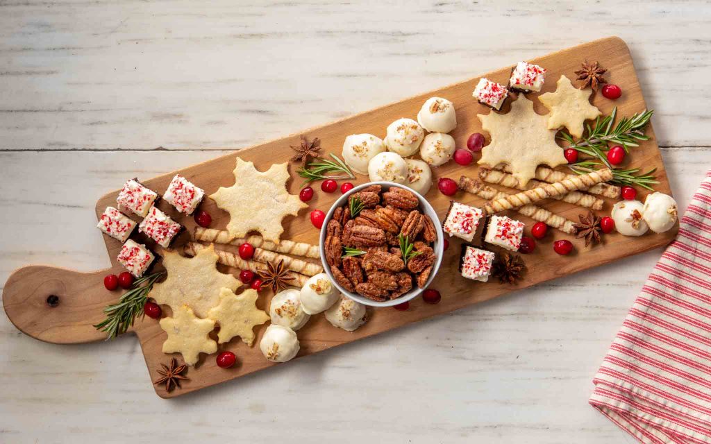 cranberries and star anise on a holiday dessert charcuterie board